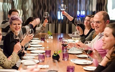 Kinetis art bloggers enjoy a dinner during their tour. (photo credit: Or Kaplan)