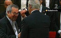 Israeli chemist Arieh Warshel accepts the Nobel Prize in Stockholm, Sweden, Tuesday, December 10, 2013 (screen capture: Channel 2)