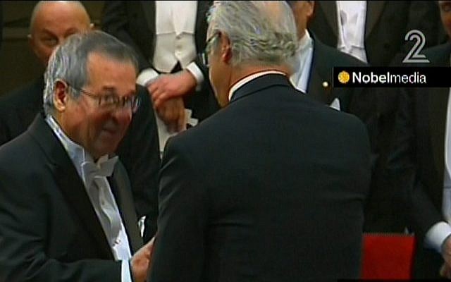 Israeli chemist Arieh Warshel accepts the Nobel Prize in Stockholm, Sweden, Tuesday, December 10, 2013 (screen capture: Channel 2) Israeli chemist Arieh Warshel accepts the Nobel Prize in Stockholm, Sweden, Tuesday, December 10, 2013 (screen capture: Channel 2)