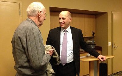 Gidi Grinstein speaks to an audience member following his book launch event at the Palo Alto JCC. (photo credit: Renee Ghert-Zand) Gidi Grinstein speaks to an audience member following his book launch event at the Palo Alto JCC. (photo credit: Renee Ghert-Zand)