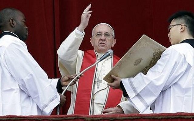 Pope Francis delivers his 'Urbi et Orbi' (to the City and to the World) message from the central balcony of St. Peter's Basilica at the Vatican, Wednesday, December 25, 2013. (photo credit: AP/Gregorio Borgia) Pope Francis delivers his 'Urbi et Orbi' (to the City and to the World) message from the central balcony of St. Peter's Basilica at the Vatican, Wednesday, December 25, 2013. (photo credit: AP/Gregorio Borgia)