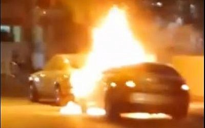 Unverified image of Oren Saudai's car after it was attacked with a Molotov Cocktail. (screen capture: Youtube/Omer Media)