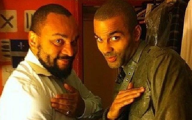 NBA star Tony Parker, right, performs the quenelle gesture with its inventor, French comedian Dieudonne (photo credit: Instagram/Bestquenelle) NBA star Tony Parker, right, performs the quenelle gesture with its inventor, French comedian Dieudonne (photo credit: Instagram/Bestquenelle)
