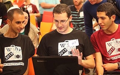 Hackers work on apps and bug fixes at the Wikimedia Israel Hackathon (Photo credit: Courtesy)