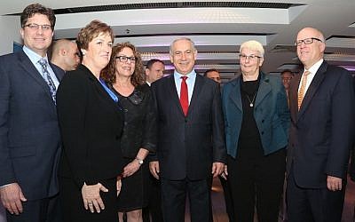 (R. to L.):  Bob Eastman, President Global Solutions at Lockheed Martin; Dr. Orna Berry, Director of EMC Israel; Prime Minister Binyamin Netanyahu; Professor Rivka Carmi, President of Ben Gurion University;  Chandra McMahon, Senior VP Commercial Markets, Lockheed Martin IS&GS; and Dr. John Evans, Vice President Business Innovation for Lockheed Martin Corporation, at the signing ceremony of the cooperation agreement between Lockheed-Martin, EMC, and Ben-Gurion University (Photo credit: Courtesy)