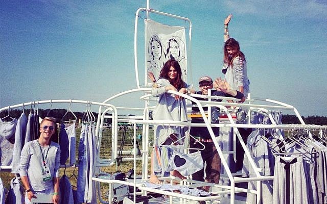 Antonina Samecka poses in the center of RISK Made in Warsaw's mobile pop-up store. (Courtesy of RISK Made in Warsaw)