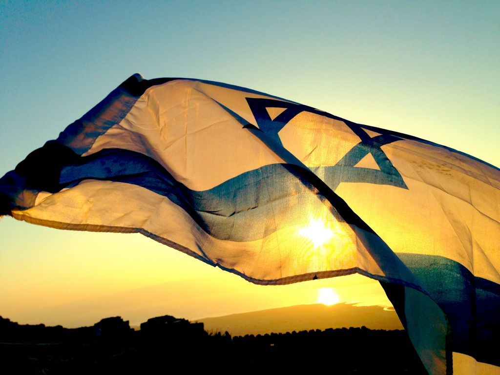 Laurel Dunay took "Dawn of the New Generation" at Masada, during her group's 4 am morning hike to watch the sunrise. "The beauty of this photo is because it all happened spontaneously. A guy in my  group started waving his Israeli flag just as we were regrouping to leave Masada and I caught the flag in the midst of waving just before the sun had fully risen. I hope people see the beauty and more importantly, the power of Israel." (photo credit: Laurel Dunay)
