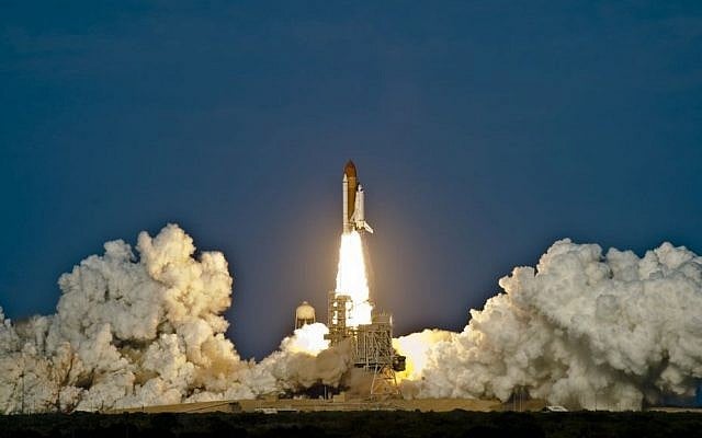 The NASA space shuttle Discovery lifts off from the Kennedy Space Center in 2011. (photo credit: NASA) The NASA space shuttle Discovery lifts off from the Kennedy Space Center in 2011. (photo credit: NASA)