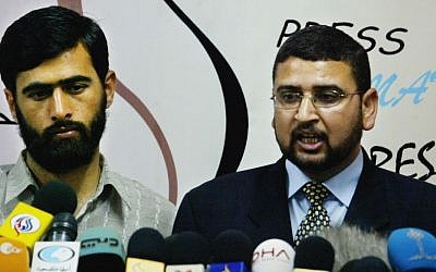 Hamas officials Sami Abu Zuhri (right) and Mushir Al-Masri in Gaza (photo credit: AP/Hatem Moussa)
