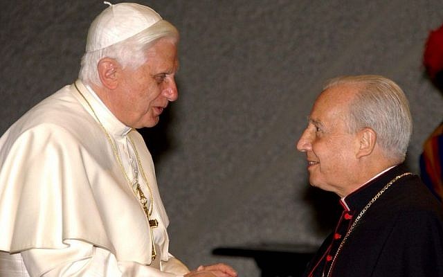 Pope Benedict XVI, left, salutes Monsignor Javier Echevarria Rodriguez, the head of the conservative Roman Catholic movement Opus Dei, during an audience with youths of Opus Dei, in the Paul VI hall at the Vatican, Monday April 10, 2006 (photo credit: AP) Pope Benedict XVI, left, salutes Monsignor Javier Echevarria Rodriguez, the head of the conservative Roman Catholic movement Opus Dei, during an audience with youths of Opus Dei, in the Paul VI hall at the Vatican, Monday April 10, 2006 (photo credit: AP)