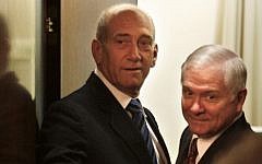 Prime Minister Ehud Olmert, left, and US defense secretary Robert Gates arrive for a meeting at the Prime Minister's Office in Jerusalem, Thursday, April 19, 2007.  (photo credit: AP Photo/Kevin Frayer)