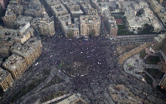 This aerial image made from an Egyptian army helicopter shows a general view of a pro-military rally marking the third anniversary of the uprising that toppled autocrat Hosni Mubarak in Tahrir Square in Cairo, Egypt, January 25, 2014. (AP/Hassan Ammar) This aerial image made from an Egyptian army helicopter shows a general view of a pro-military rally marking the third anniversary of the uprising that toppled autocrat Hosni Mubarak in Tahrir Square in Cairo, Egypt, January 25, 2014. (AP/Hassan Ammar)