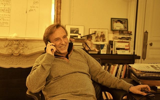 Alexandre Arcady, one of France's best-known directors, is making a feature film about the 2006 murder of Ilan Halimi. Arcady is pictured here in his Paris office. (Cnaan Liphshiz/JTA)