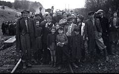 Former inmates, who were transported by train from Bergen-Belsen, were photographed in Farsleben, Germany, shortly after their liberation by US troops on Apr. 13, 1945. (United States Holocaust Memorial Museum, courtesy of George Gross)