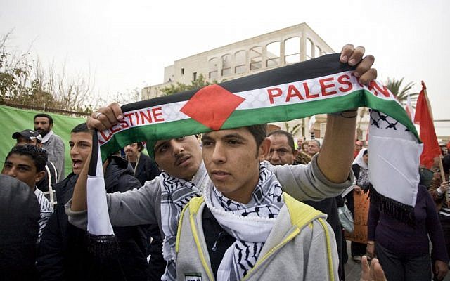 Arab men march in Jaffa on Land Day, an annual day of protest against government appropriation of Arab-owned land,  April 2011 (photo credit:  Dima Vazinovich/Flash90)