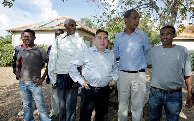 Sharansky visits Ethiopian immigrants at the Jewish Agency's IBIM absorption center, near the southern Israeli town of Sderot (Photo credit: Moshe Shai/FLASH90) Sharansky visits Ethiopian immigrants at the Jewish Agency's IBIM absorption center, near the southern Israeli town of Sderot (Photo credit: Moshe Shai/FLASH90)