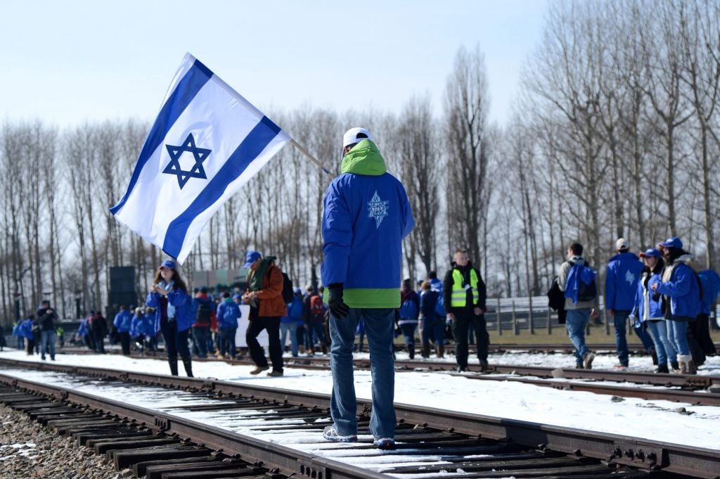An Israeli delegation seen visiting the Auschwitz death camp in Poland, April 8, 2013. (Photo credit: Yossi Zeliger/FLASH90) An Israeli delegation seen visiting the Auschwitz death camp in Poland, April 8, 2013. (Photo credit: Yossi Zeliger/FLASH90)