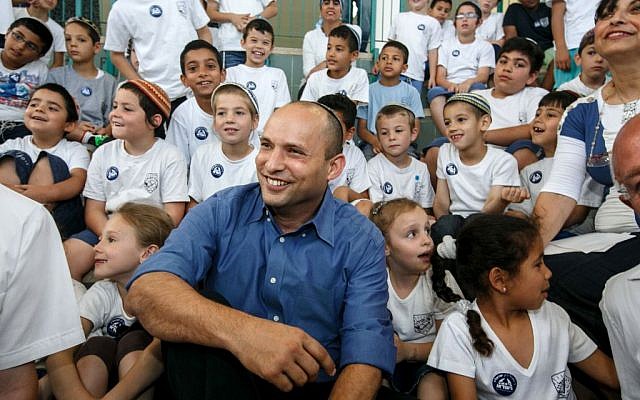 Jewish Home party leader Naftali Bennett with children during a visit to the West Bank settlement city of Ariel, on June 4, 2013. (Assaf Shilo/Israel Sun/Flash 90) Jewish Home party leader Naftali Bennett with children during a visit to the West Bank settlement city of Ariel, on June 4, 2013. (Assaf Shilo/Israel Sun/Flash 90)