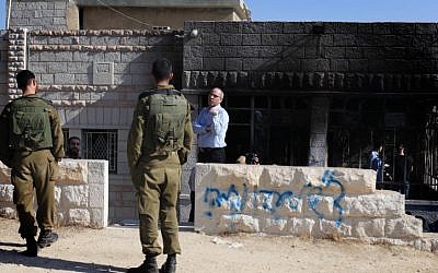 A November 2013 attack in the West Bank village of Sinjil, in which a home was torched (Photo credit: Issam Rimawi/ Flash 90)