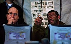 Moshe Ya'alon, left, meeting with troops in December 2013. (photo credit: Ariel Hermoni/Ministry of Defence/FLASH90)