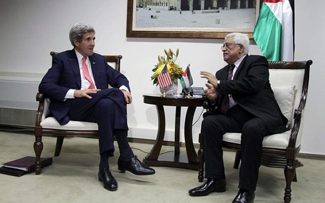 US Secretary of State John Kerry (L) meets with President  of the Palestinian Authority Mahmoud Abbas in the West Bank city of Ramallah on January 3, 2014. (photo credit: Issam Rimawi/Flash90)