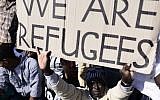 Migrants protesting in Tel Aviv Monday. (photo credit: Tomer Neuberg/Flash90)