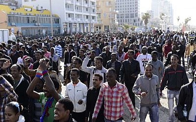 African asylum seekers protest outside the US Embassy in Tel Aviv on Monday. (photo credit: Tomer Neuberg/Flash90)