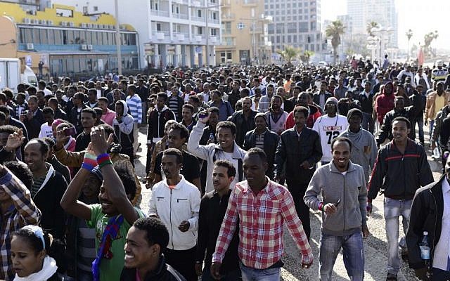 Eritrean asylum seekers march down Tel Aviv's boardwalk toward the US Embassy in 2014 (Tomer Neuberg/Flash90) Eritrean asylum seekers march down Tel Aviv's boardwalk toward the US Embassy in 2014 (Tomer Neuberg/Flash90)