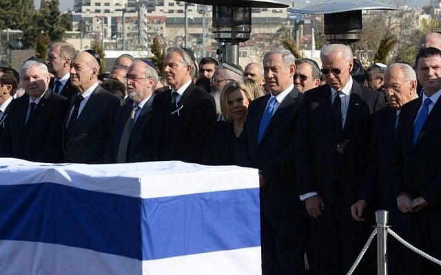Israeli and world leaders stand in front of Ariel Sharons flag-draped casket, during a ceremony in honor of the former prime minister in front of the Knesset in Jerusalem, Monday, January 13, 2014 (photo credit: Amos Ben Gershom/GPO/Flash90) Israeli and world leaders stand in front of Ariel Sharons flag-draped casket, during a ceremony in honor of the former prime minister in front of the Knesset in Jerusalem, Monday, January 13, 2014 (photo credit: Amos Ben Gershom/GPO/Flash90)