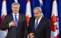 Prime Minister Benjamin Netanyahu (R) seen with his Canadian counterpart Stephen Harper during a welcoming ceremony for Harper at Netanyahu's office in Jerusalem January 19, 2014.  (photo credit: Flash90)