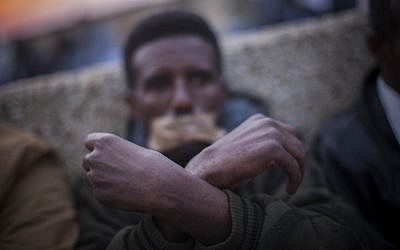 African asylum seekers protest outside the US embassy in Tel Aviv on January 22, 2014 (photo credit: Yonatan Sindel/Flash90)