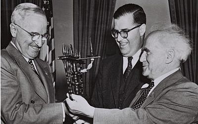 Harry Truman receives a gift from Israeli Prime Minister David Ben Gurion and Israel's Ambassador to the US Abba Eban at the White House in 1951. (Courtesy GPO)