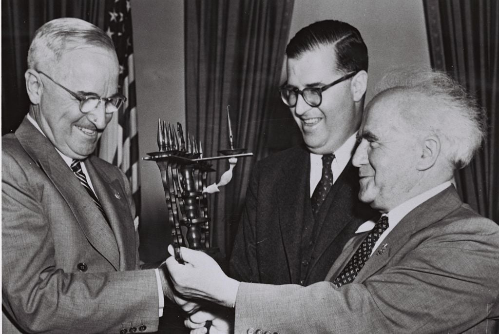 Harry Truman receives a gift from Israeli Prime Minister and Israeli Ambassador to the US Abba Eban at the White House in 1951. (photo credit: Courtesy GPO)