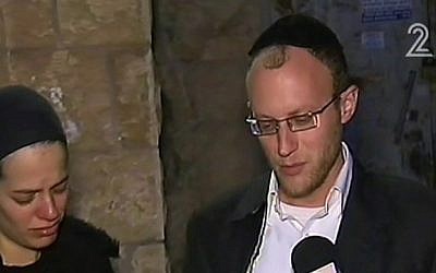 Shimon and Michal Gross, who lost two daughters after an exterminator treated their house, speak to the media Thursday (screen capture: Channel 2)