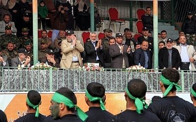 Hamas Prime Minister Ismail Haniyeh (center) attends the graduation ceremony in Gaza, January 13, 2014 (photo credit: Hamas interior ministry website)