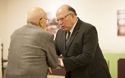 Professor Uzi Arad greets attendees at the first annual lecture in memory of Professor Zvi Yavetz in Tel Aviv, January 28, 2014 (photo credit: Roee Shpernik)