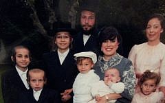 Menachem Stark, center, with his wife and seven children (photo credit: JTA/courtesy/File)