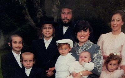 Menachem Stark, center, with his wife and seven children (photo credit: JTA/courtesy/File)