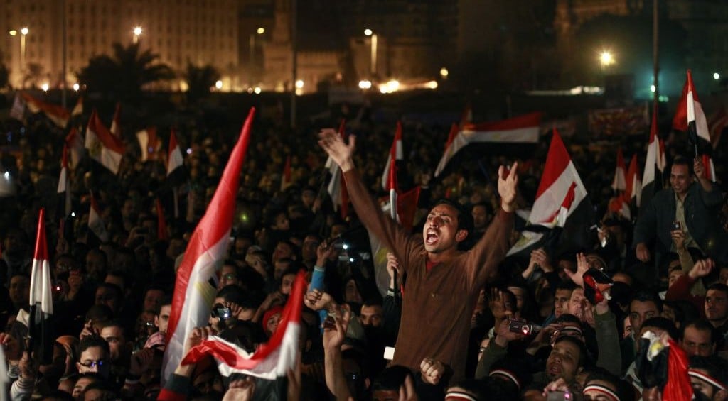 In this February 11, 2011, file photo, Egyptians celebrate the news of the resignation of President Hosni Mubarak, who handed control of the country to the military, at night in Tahrir Square in downtown Cairo, Egypt. (AP Photo/Ben Curtis) In this February 11, 2011, file photo, Egyptians celebrate the news of the resignation of President Hosni Mubarak, who handed control of the country to the military, at night in Tahrir Square in downtown Cairo, Egypt. (AP Photo/Ben Curtis)