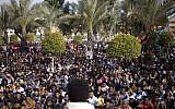 African protesters and supporters gather at Tel Aviv's Levinsky Park on Tuesday (photo credit: AP/Ariel Schalit)