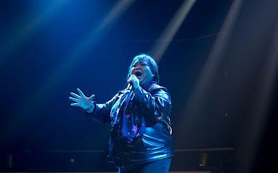 Rose Fostanes sings during a rehearsal of X-Factor Israel in Tel Aviv, Jan. 1, 2014 (photo credit: AP/Ariel Schalit)