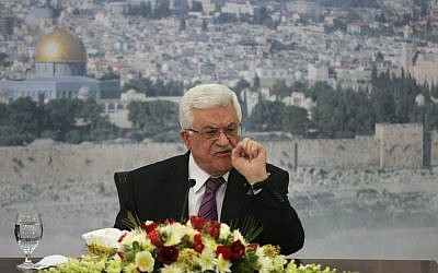 Palestinian Authority President Mahmoud Abbas speaks during a meeting at his compound in the West Bank city of Ramallah, Saturday, Jan. 11, 2014. (photo credit: AP/Majdi Mohammed) 