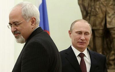 Russian President Vladimir Putin and Iranian Foreign Minister Mohammad Javad Zarif during a meeting in the Kremlin in Moscow, Russia, on January 16, 2014. (photo credit: AP/Sergei Karpukhin, Pool) Russian President Vladimir Putin and Iranian Foreign Minister Mohammad Javad Zarif during a meeting in the Kremlin in Moscow, Russia, on January 16, 2014. (photo credit: AP/Sergei Karpukhin, Pool)