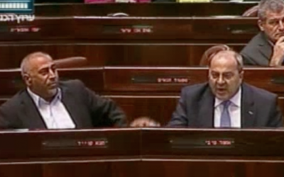 Taleb Abu Arar (left) and Ahmad Tibi heckle Prime Minister Benjamin Netanyahu during a special Knesset session addressed by Canadian Prime Minister Stephen Harper on Tuesday (photo credit: Channel 2 screenshot) Taleb Abu Arar (left) and Ahmad Tibi heckle Prime Minister Benjamin Netanyahu during a special Knesset session addressed by Canadian Prime Minister Stephen Harper on Tuesday (photo credit: Channel 2 screenshot)