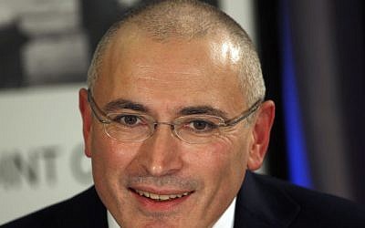 Mikhail Khodorkovsky speaks during a news conference in Berlin, December 22, 2013. (Photo credit: AP/Michael Sohn, File)