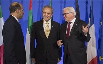 Syrian National Coalition Chief Ahmad al-Jarba, left, Saudi Foreign Minister Prince Saud al-Faisal, center, and German Foreign Minister Frank-Walter Steinmeier, talk prior to a press conference at the foreign ministry in Paris,  Jan. 12, 2014  (photo credit: AP/Michel Euler)