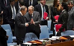 Jordanian Foreign Minister and President of the United Nations Security Council Nasser Judeh, right, has a conversation with UN Secretary General Ban Ki-moon as a Security Council meeting began at UN headquarters on Monday, January 20, 2014. (photo credit: AP/Craig Ruttle)