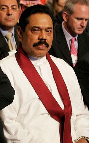 Mahinda Rajapaska (photo credit: World Economic Forum; Nader Daoud/Wikipedia)