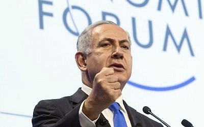 Prime Minister Benjamin Netanyahu speaks during a session at the World Economic Forum in Davos, Switzerland, Thursday, January 23, 2014 (photo credit: AP Photo/Michel Euler)