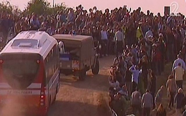 Ariel Sharon's casket arrives at Sycamore Farm in the western Negev for the funeral of the former premier. (photo credit: screen shot/Channel 2)
